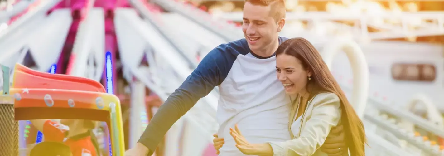 couple playing carnival games