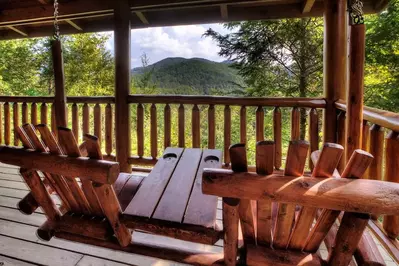 mountain view from the deck of a cabin in the Smoky Mountains 