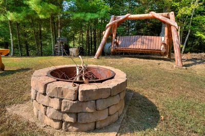the fire pit at 1 Bears Up There makes it one of our top Smoky Mountain romantic cabins